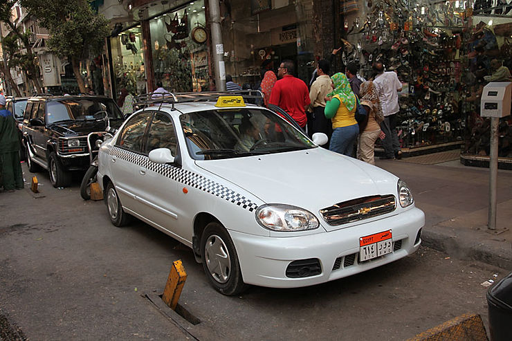 Transportation in Cairo Egypt. White taxi and white cabs in Cairo